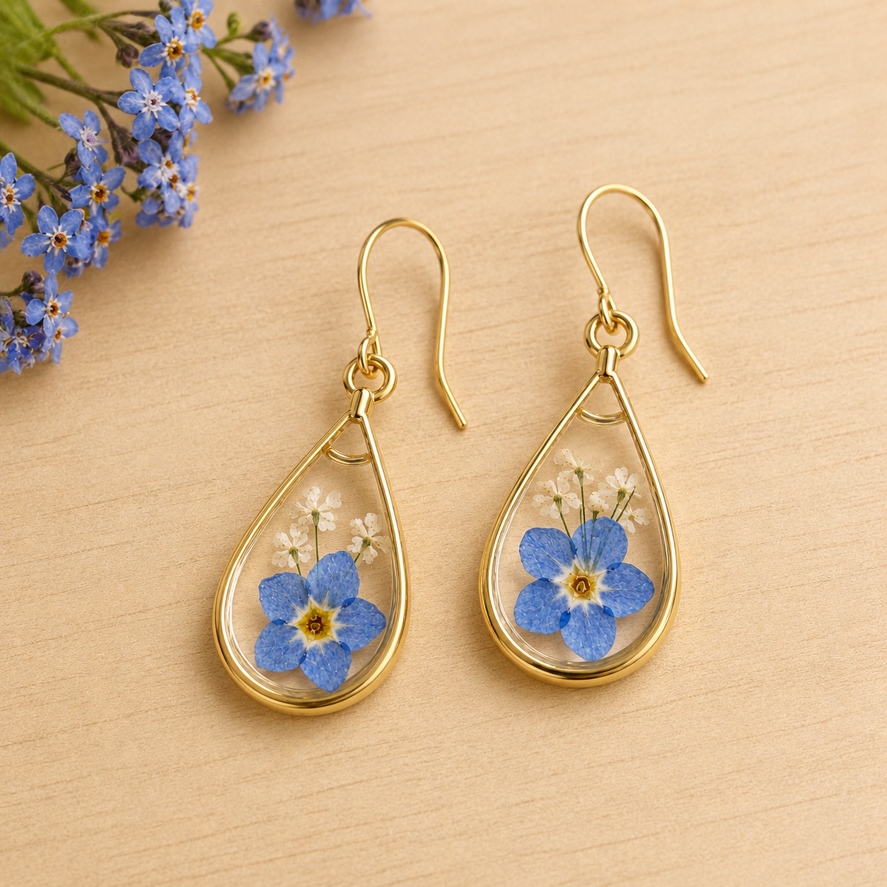 Forget-me-not teardrop earrings in 18K gold