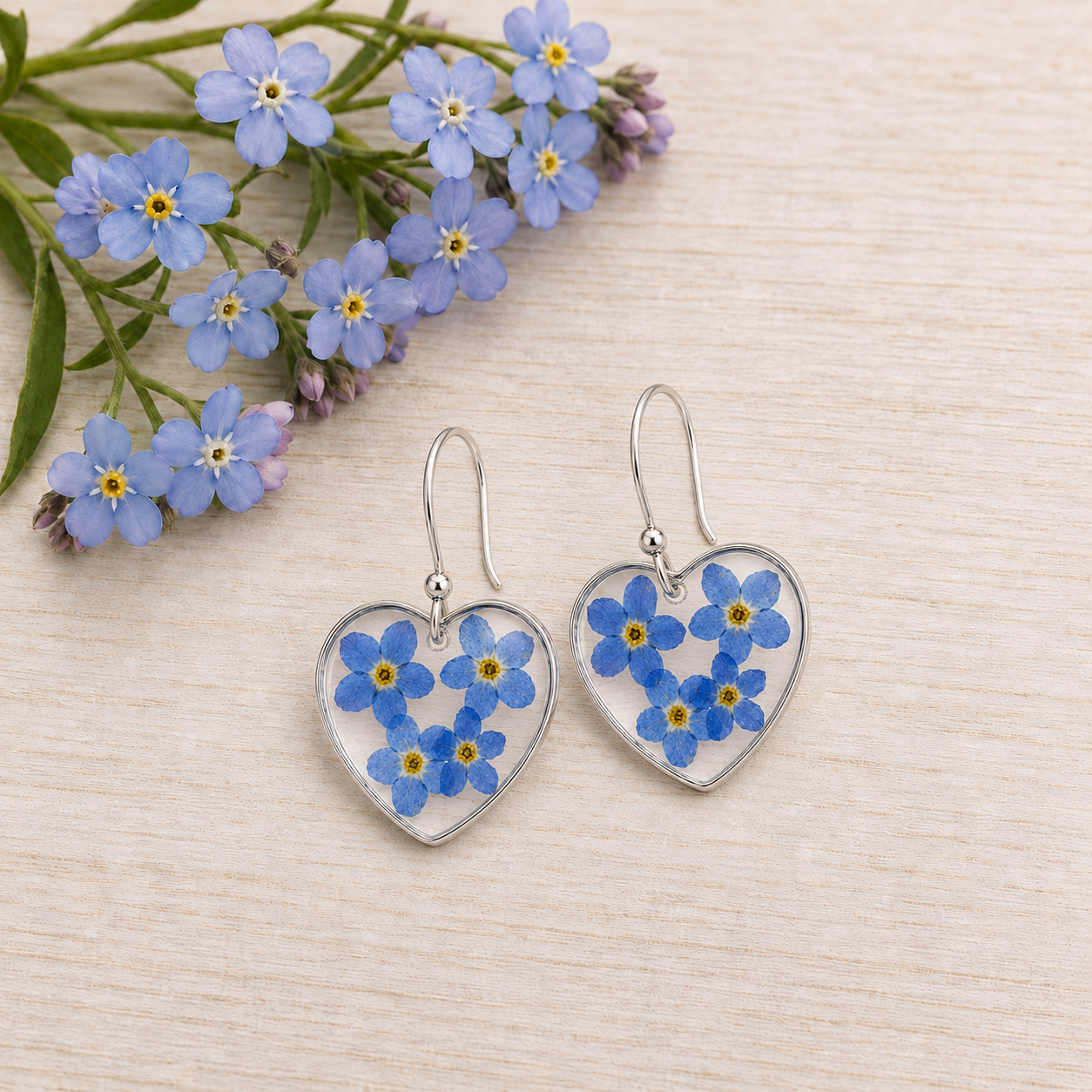Forget-me-not heart resin earrings in silver