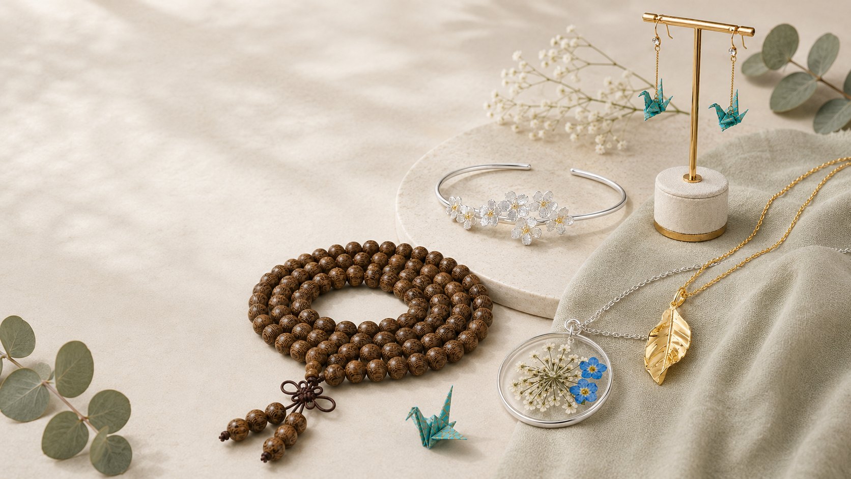 A selection of Echo Jewellery made with real flowers, folded paper, silver, gold-plated metal and natural beads